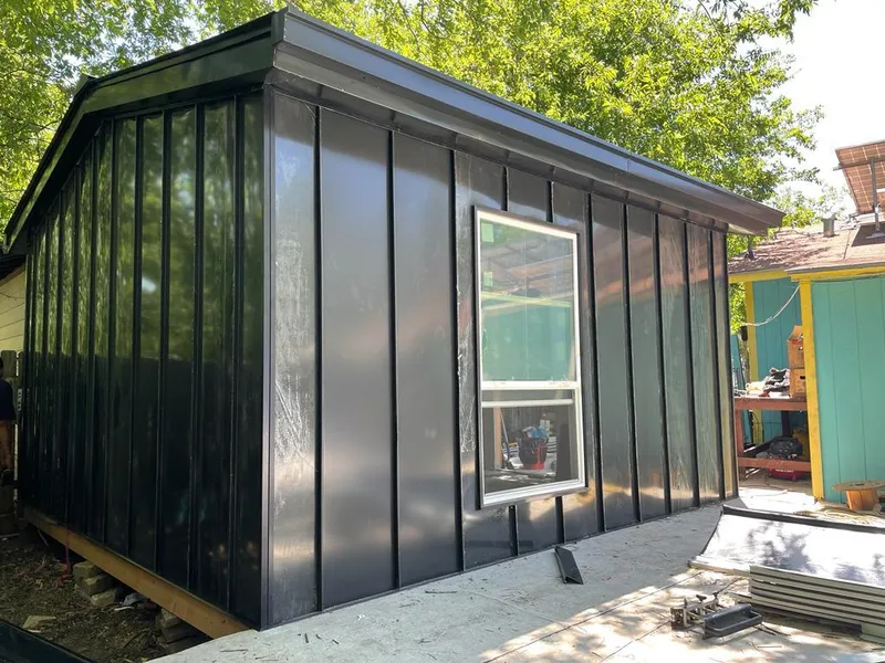 Black standing seam metal wall panels for Roof Inspection in Carpinteria