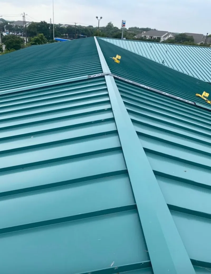 Green commercial metal roof ridge and valley for Metal Roof Repair in Carpinteria