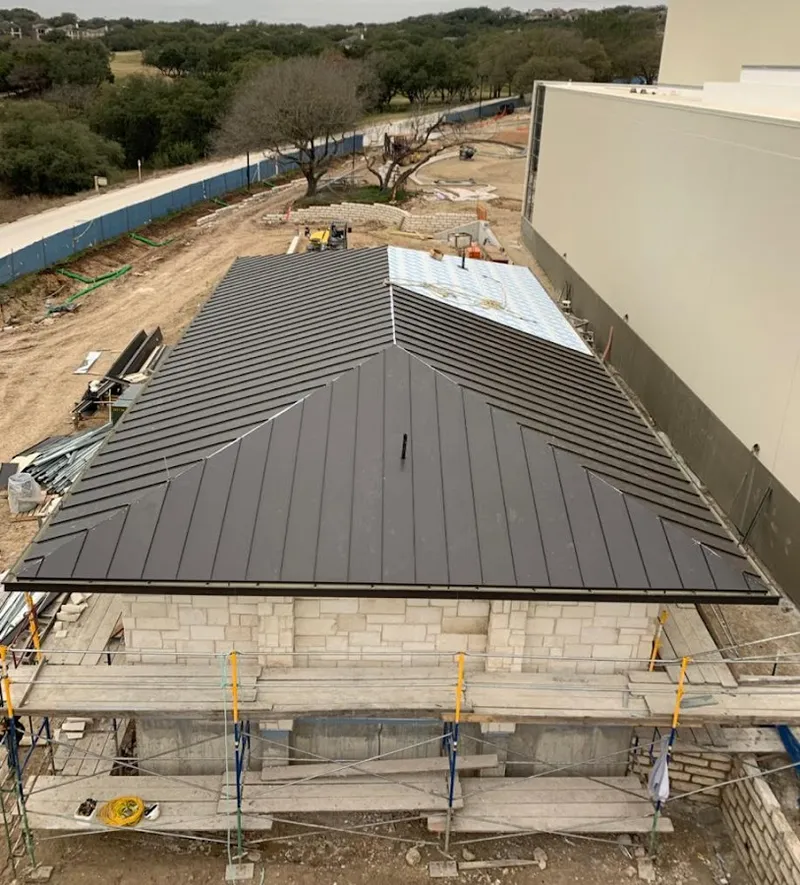 Metal roof new construction with scaffolding in Carpinteria